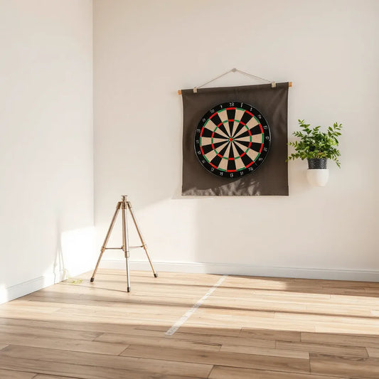 Mounted dartboard with protective backing and a clear throwing line in a home room